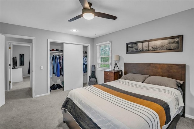 bedroom featuring carpet floors, a closet, a ceiling fan, and baseboards