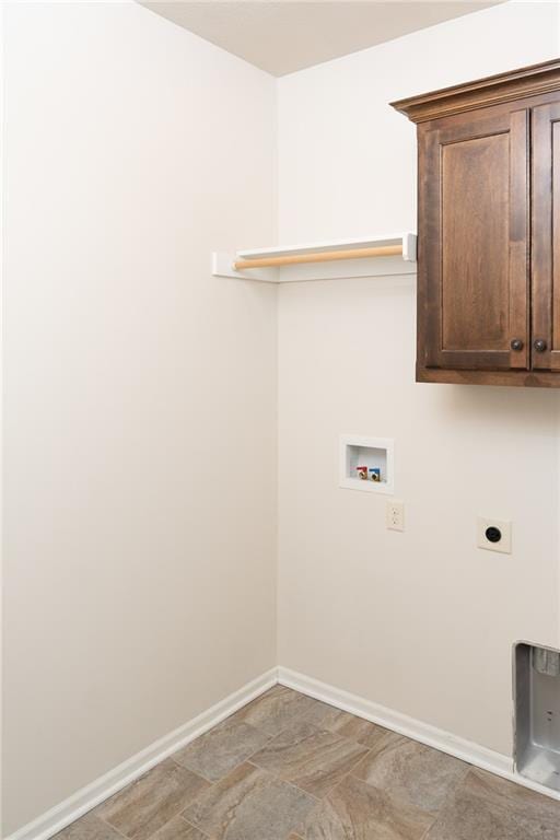 2200 NW Hedgewood Dr, Grain Valley, MO 64029 - laundry room with hookup for a washing machine, cabinet space, electric dryer hookup, and baseboards