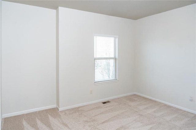 2200 NW Hedgewood Dr, Grain Valley, MO 64029 - unfurnished room featuring light carpet and baseboards