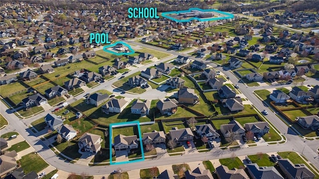 2200 NW Hedgewood Dr, Grain Valley, MO 64029 - aerial overview of property's location with property parcel outlined and nearby suburban area