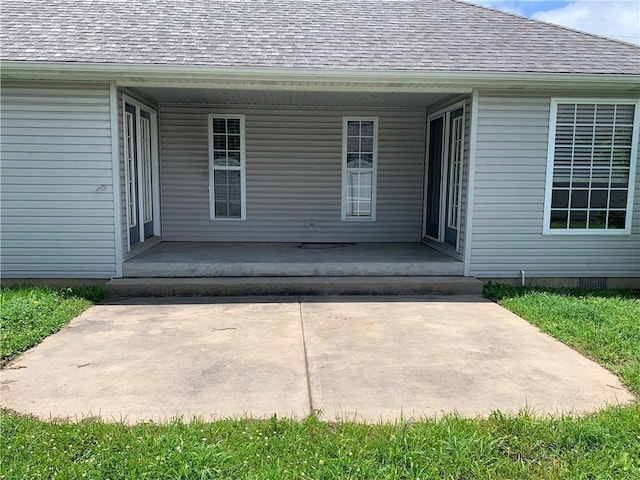 1019 S Hugh St, Frontenac, KS 66763 - doorway to property with roof with shingles and a porch