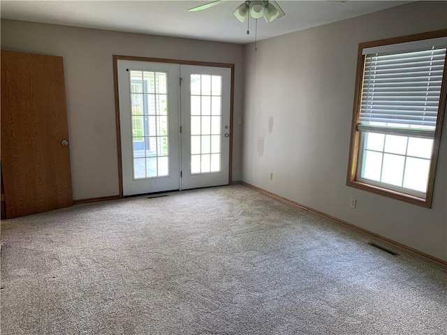 1019 S Hugh St, Frontenac, KS 66763 - unfurnished room featuring ceiling fan and carpet floors