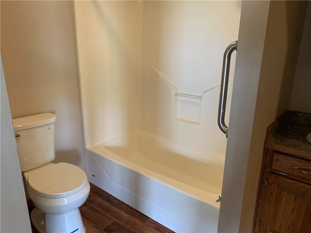 1019 S Hugh St, Frontenac, KS 66763 - bathroom with vanity, wood finished floors, and shower / bath combination
