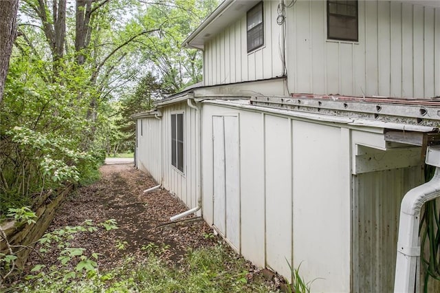 view of property exterior with board and batten siding