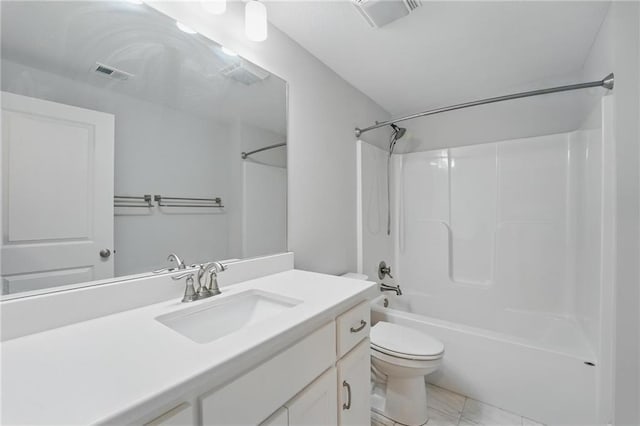 bathroom featuring visible vents, vanity, toilet, marble finish floor, and tub / shower combination