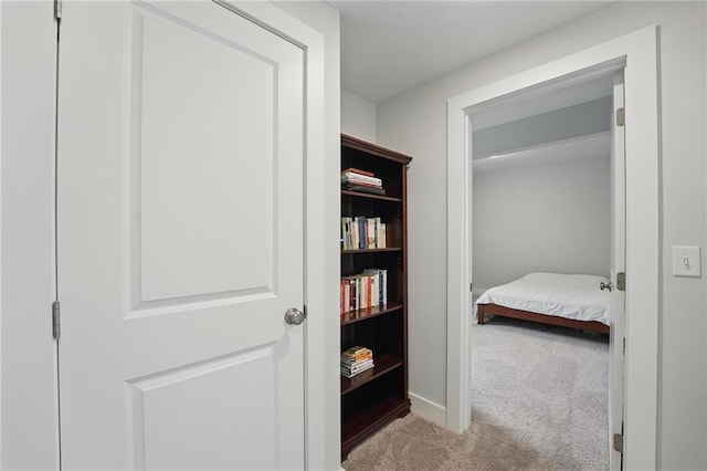 interior space featuring baseboards
