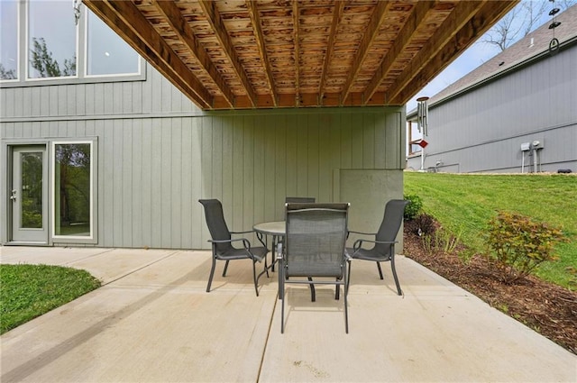 view of patio featuring outdoor dining area