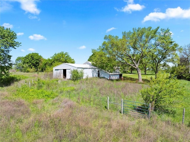 657 N 400th Rd, Overbrook, KS 66524 - view of yard with fence, an outbuilding, and an outdoor structure