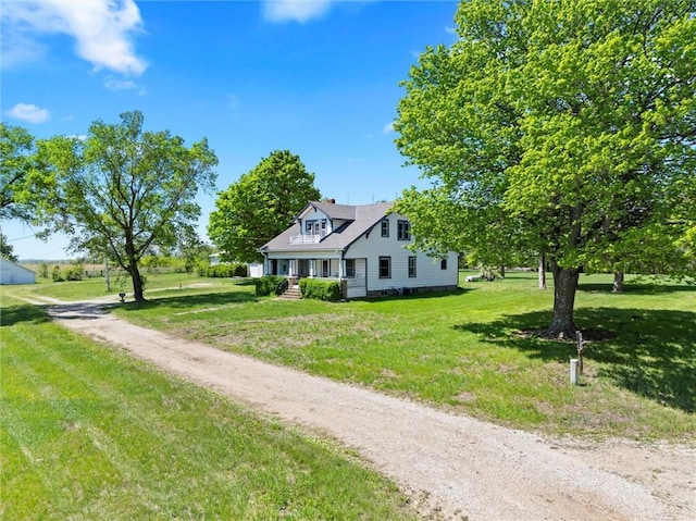 657 N 400th Rd, Overbrook, KS 66524 - view of front of house featuring a front lawn, dirt driveway, and a chimney