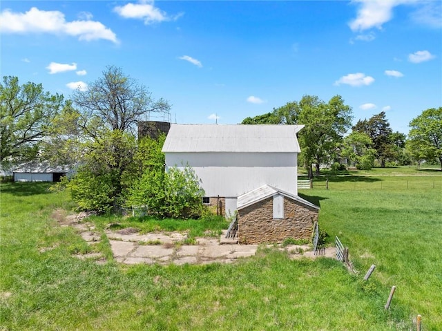 657 N 400th Rd, Overbrook, KS 66524 - view of property exterior with a lawn and an outdoor structure