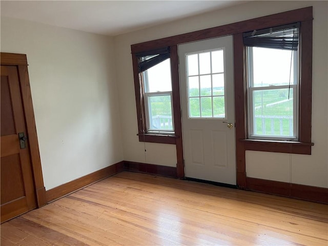 657 N 400th Rd, Overbrook, KS 66524 - doorway with light wood finished floors and baseboards