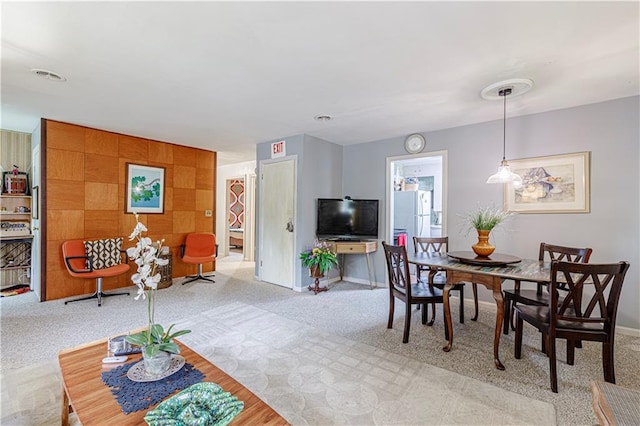636 S Fuller Ave, Independence, MO 64052 - carpeted dining area with baseboards