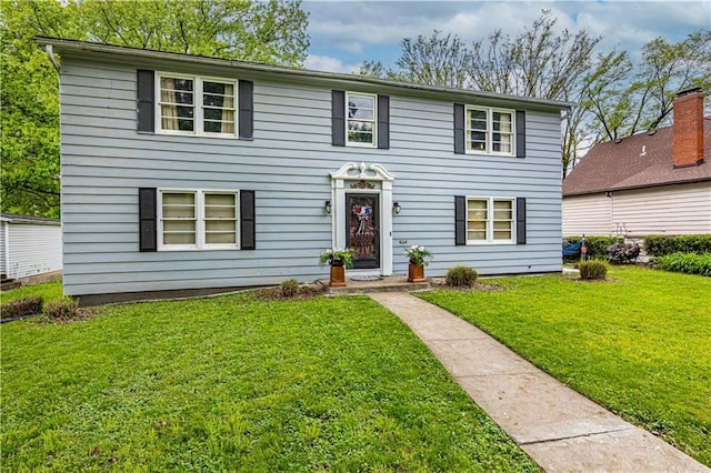 636 S Fuller Ave, Independence, MO 64052 - view of front of home with a front yard
