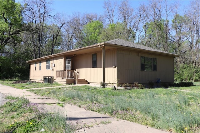 view of front of house with central air condition unit