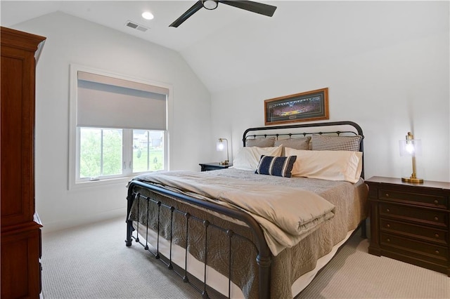bedroom with carpet floors, a ceiling fan, visible vents, and lofted ceiling