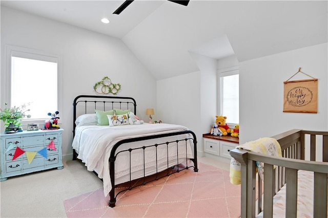 bedroom with recessed lighting, ceiling fan, light colored carpet, and vaulted ceiling