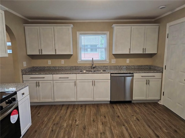 kitchen featuring dark wood-style flooring, arched walkways, appliances with stainless steel finishes, and a sink