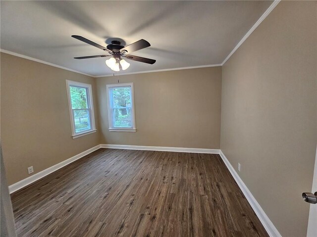unfurnished room with ceiling fan, dark wood finished floors, and baseboards