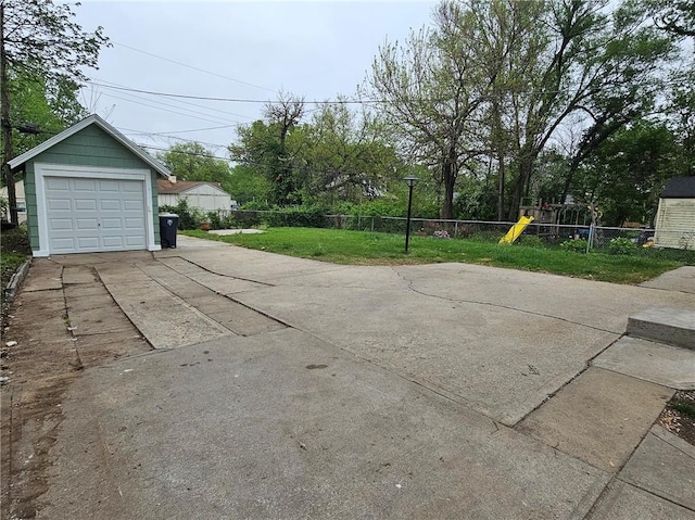 exterior space with fence and driveway