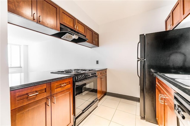 kitchen featuring gas stove, dishwasher, baseboards, light tile patterned floors, and under cabinet range hood