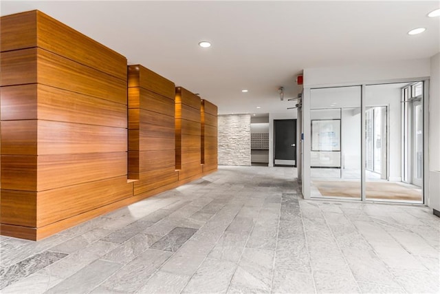 hall with recessed lighting