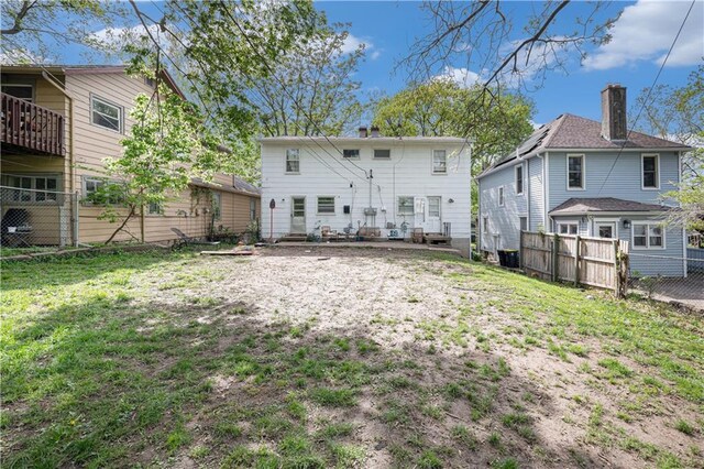 3525-3527 Bell St, Kansas City, MO 64111 - back of property with fence