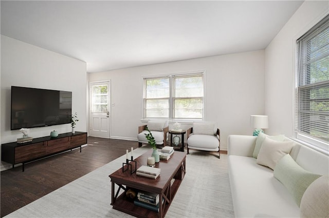 3525-3527 Bell St, Kansas City, MO 64111 - living area featuring wood finished floors and baseboards