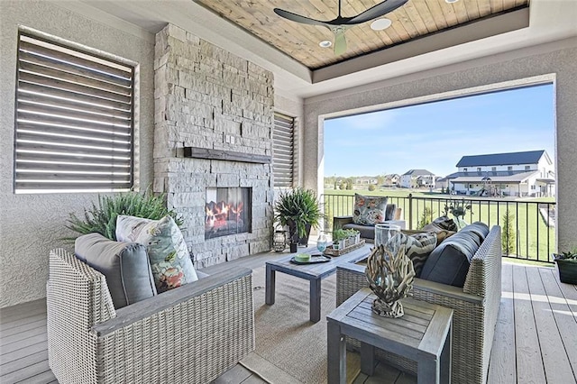 12605 W 170th St, Overland Park, KS 66221 - wooden deck featuring an outdoor living space with a fireplace, ceiling fan, and a residential view