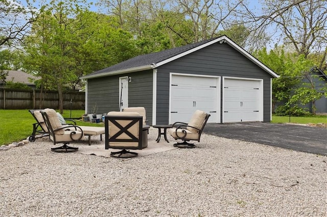 detached garage with fence