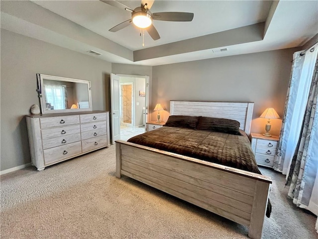 bedroom featuring baseboards, ceiling fan, carpet flooring, and visible vents