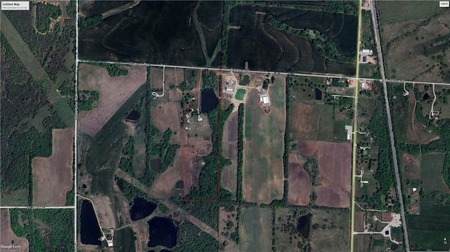 aerial map of property and surrounding area with property parcel outlined