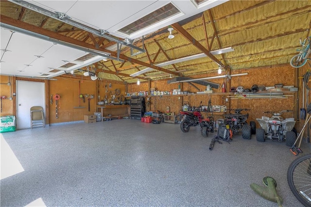 garage featuring a workshop area