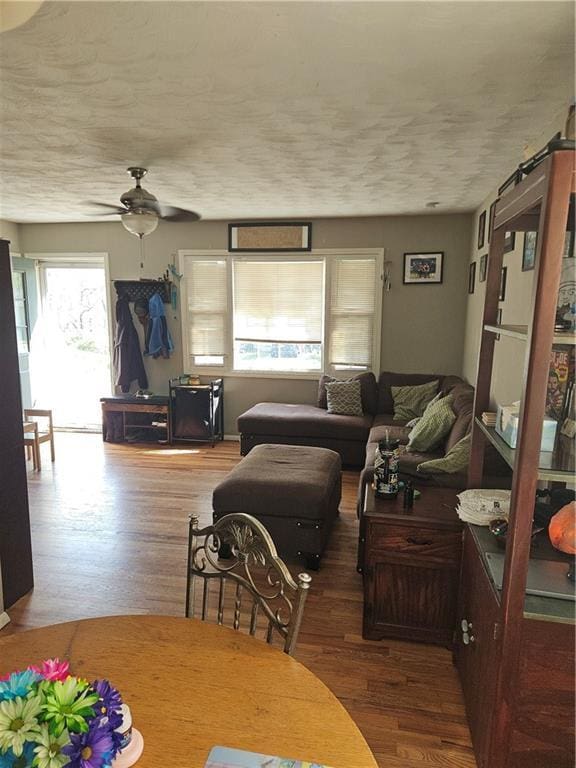 8212 NE 51st St, Kansas City, MO 64119 - interior space with a ceiling fan and wood finished floors