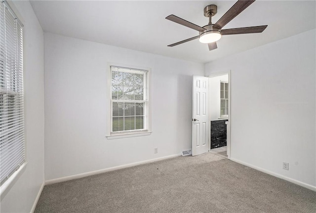 321 22nd Street Ter, Blue Springs, MO 64015 - empty room with light colored carpet, a ceiling fan, baseboards, and visible vents