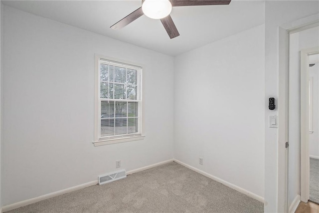321 22nd Street Ter, Blue Springs, MO 64015 - unfurnished room featuring baseboards, ceiling fan, light colored carpet, and visible vents