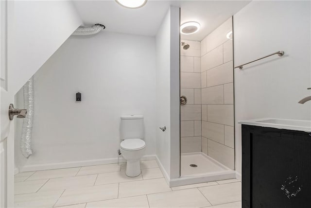 321 22nd Street Ter, Blue Springs, MO 64015 - full bath with tile patterned flooring, a stall shower, vanity, baseboards, and toilet