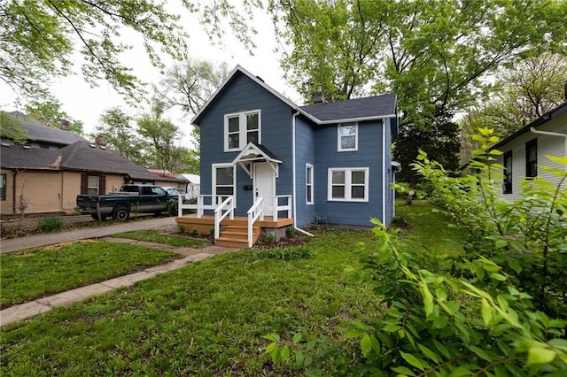 view of front facade featuring a front yard