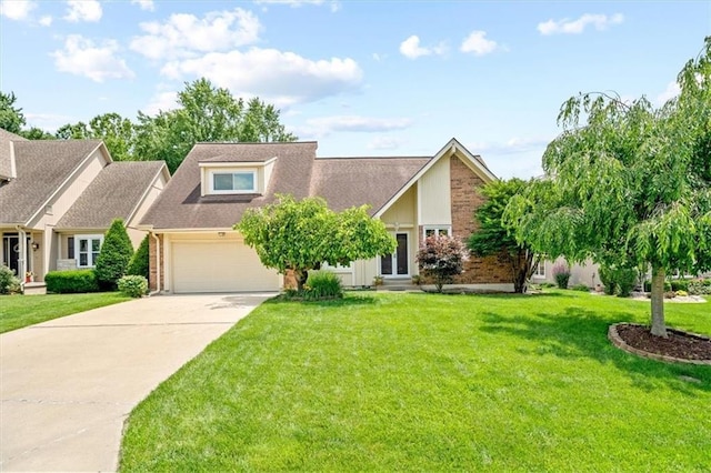 4071 SW Royale Ct, Lees Summit, MO 64082 - view of front facade with driveway, a front lawn, brick siding, and a garage