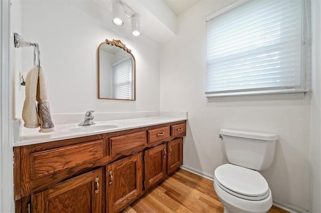 4071 SW Royale Ct, Lees Summit, MO 64082 - half bathroom with vanity and wood finished floors