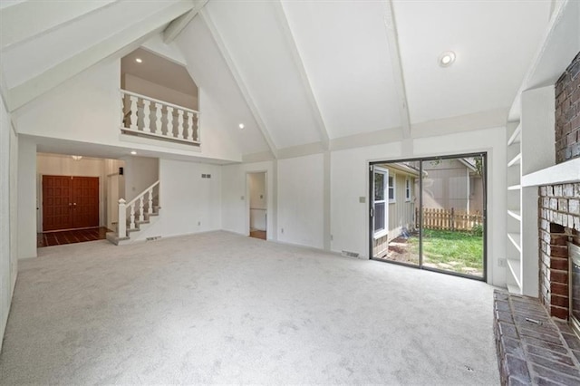 4071 SW Royale Ct, Lees Summit, MO 64082 - unfurnished living room with beam ceiling, high vaulted ceiling, carpet, a fireplace, and stairway