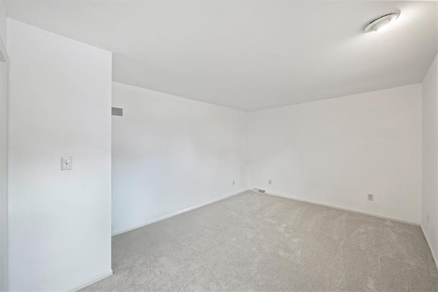 4071 SW Royale Ct, Lees Summit, MO 64082 - carpeted spare room featuring baseboards