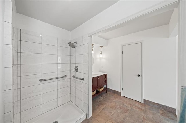 4071 SW Royale Ct, Lees Summit, MO 64082 - full bath featuring a tile shower, vanity, and stone finish floors