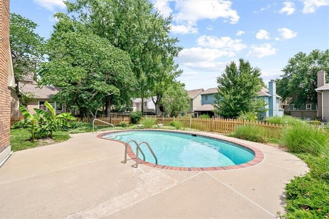 4071 SW Royale Ct, Lees Summit, MO 64082 - view of pool with a patio and a residential view