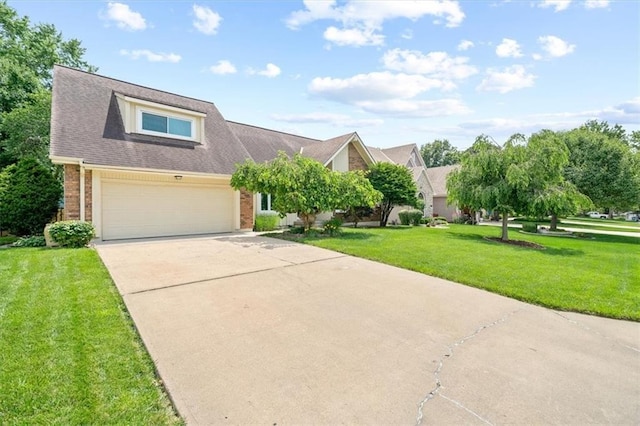 4071 SW Royale Ct, Lees Summit, MO 64082 - view of front facade featuring brick siding, driveway, a garage, and a front lawn