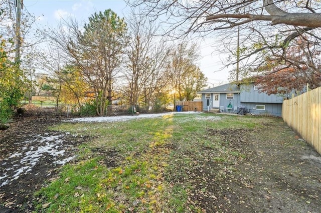 view of yard with a fenced backyard
