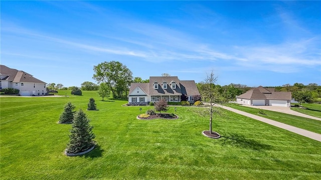 view of front of house featuring a front lawn and driveway