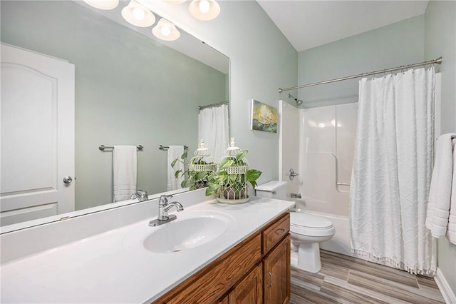 full bathroom featuring vanity, shower / bath combo, toilet, and wood finished floors