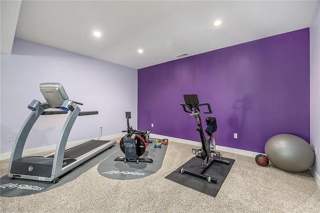 exercise area with visible vents, recessed lighting, and baseboards