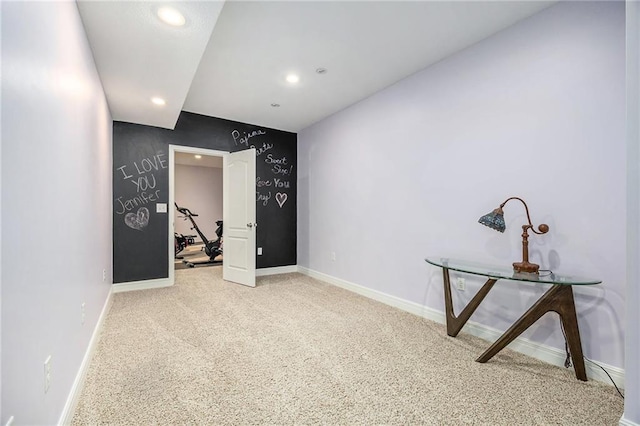 interior space with recessed lighting and baseboards