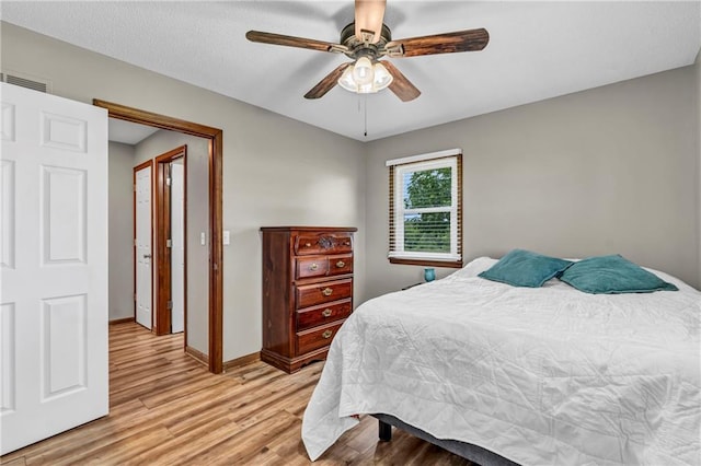19890 State Highway C, Pattonsburg, MO 64670 - bedroom with light wood-style flooring, baseboards, and ceiling fan